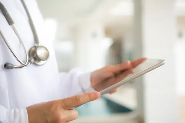 doctor with tablet hands 1232 650 Phlebectomy in Abingdon VA